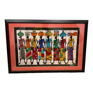 Framed art - a batik of colorful women